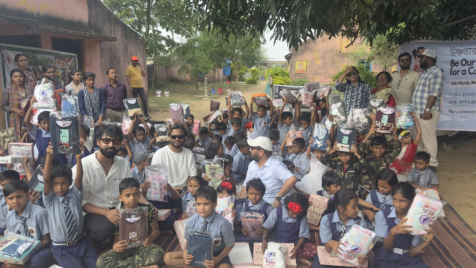 Together at Belma: children, teachers and the Porshi family.